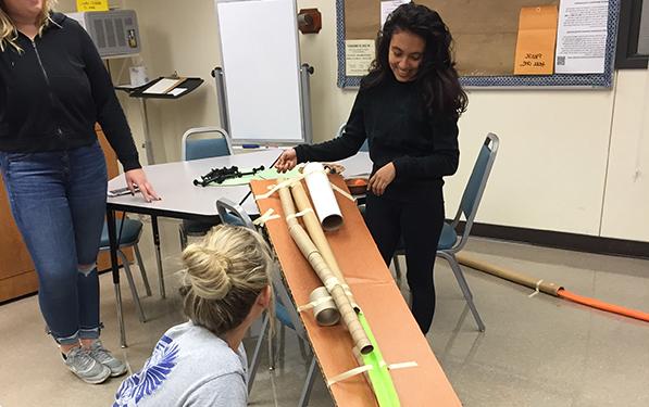 students constructing a slide